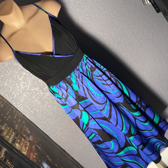 Maggy London Dresses & Skirts - MAGGY LONDON - dress: floral lined bottom and black stretchy strappy top - 16